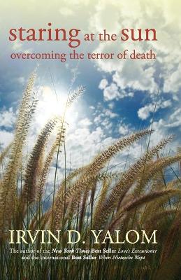 STARING AT THE SUN : OVERCOMING THE TERROR OF DEATH